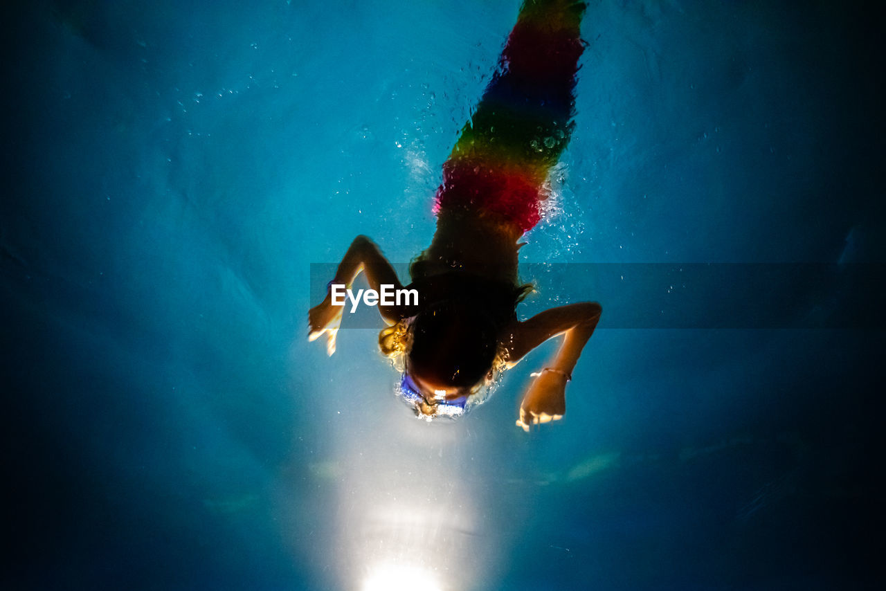 Girl swimming in sea