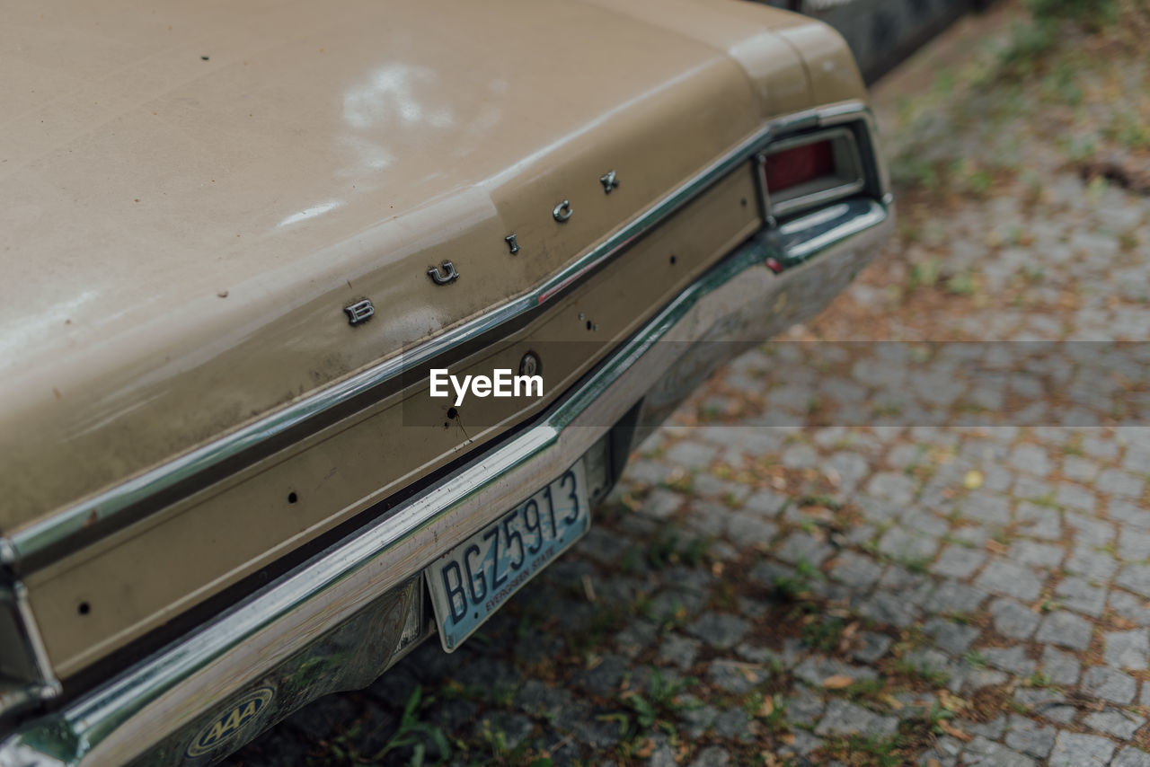 car, automotive exterior, vehicle, bumper, mode of transportation, transportation, motor vehicle, no people, luxury vehicle, land vehicle, day, retro styled, family car, metal, wheel, vintage car, old, focus on foreground, outdoors