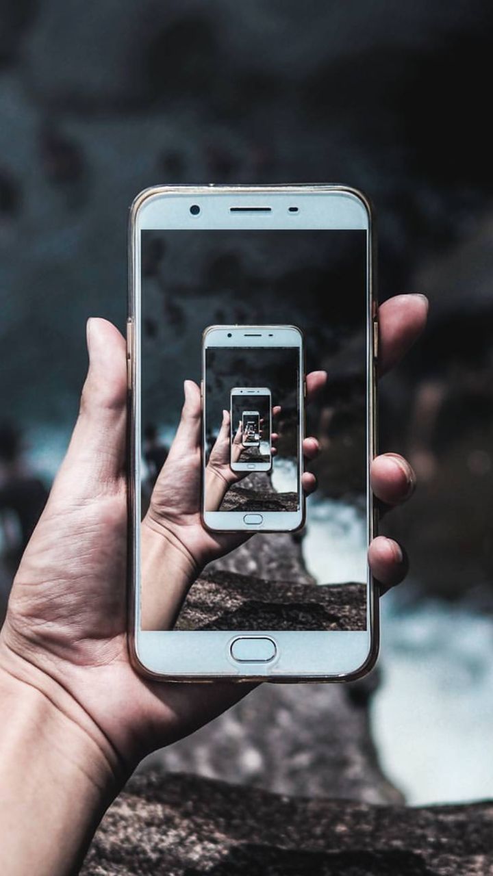 Close-up of hand holding smart phone