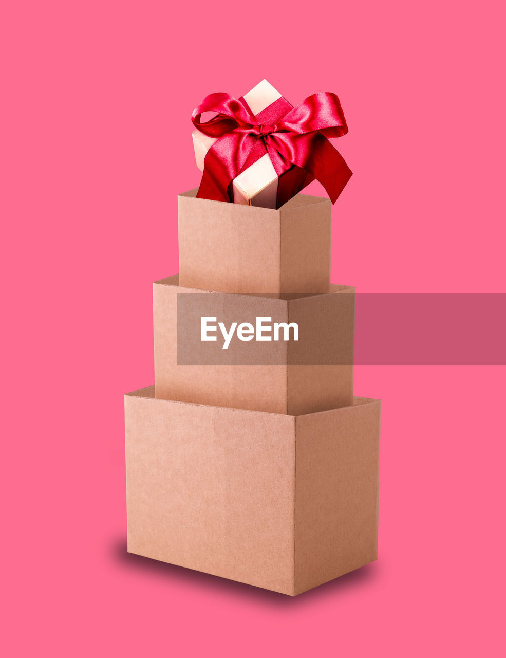 box, gift, gift box, paper, pink, container, ribbon, cardboard, celebration, surprise, studio shot, christmas present, bow, indoors, tied bow, cardboard box, wrapping paper, red, wrapped, colored background, package, no people, single object, holiday, birthday present, cut out, copy space, giving, emotion, anniversary, birthday, event, large group of objects, brown paper, opening, still life, anticipation, group of objects