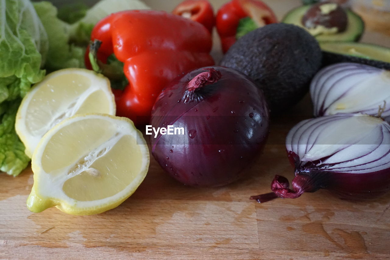 Close-up of fresh vegetables on chopping board