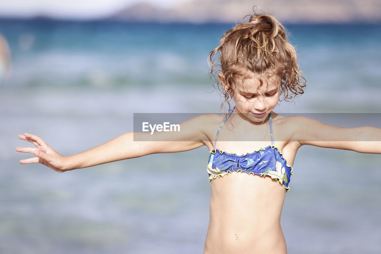 portrait of young woman in bikini