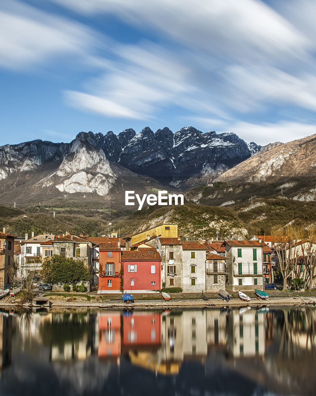 Snowcapped mountain against cloudy sky