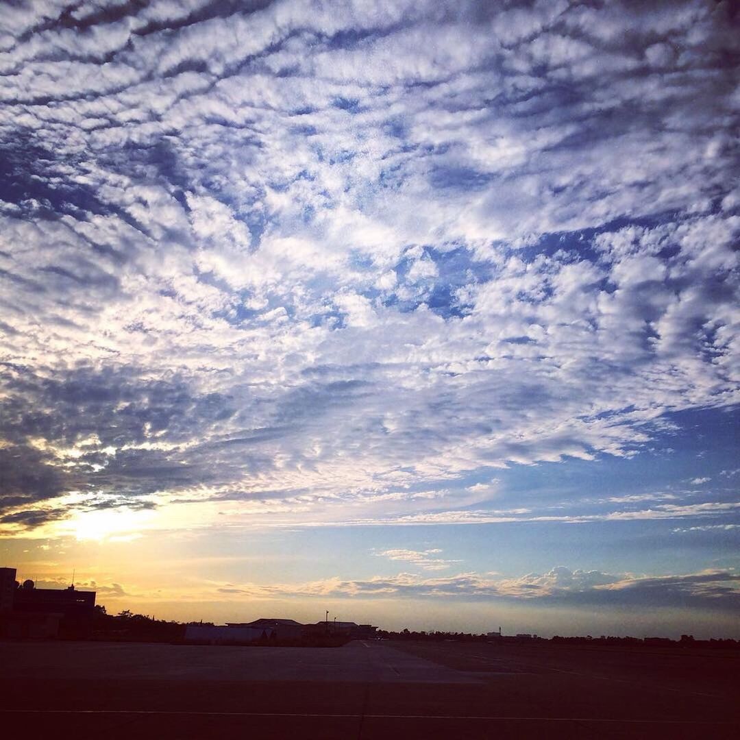 SCENIC VIEW OF LANDSCAPE AGAINST SUNSET