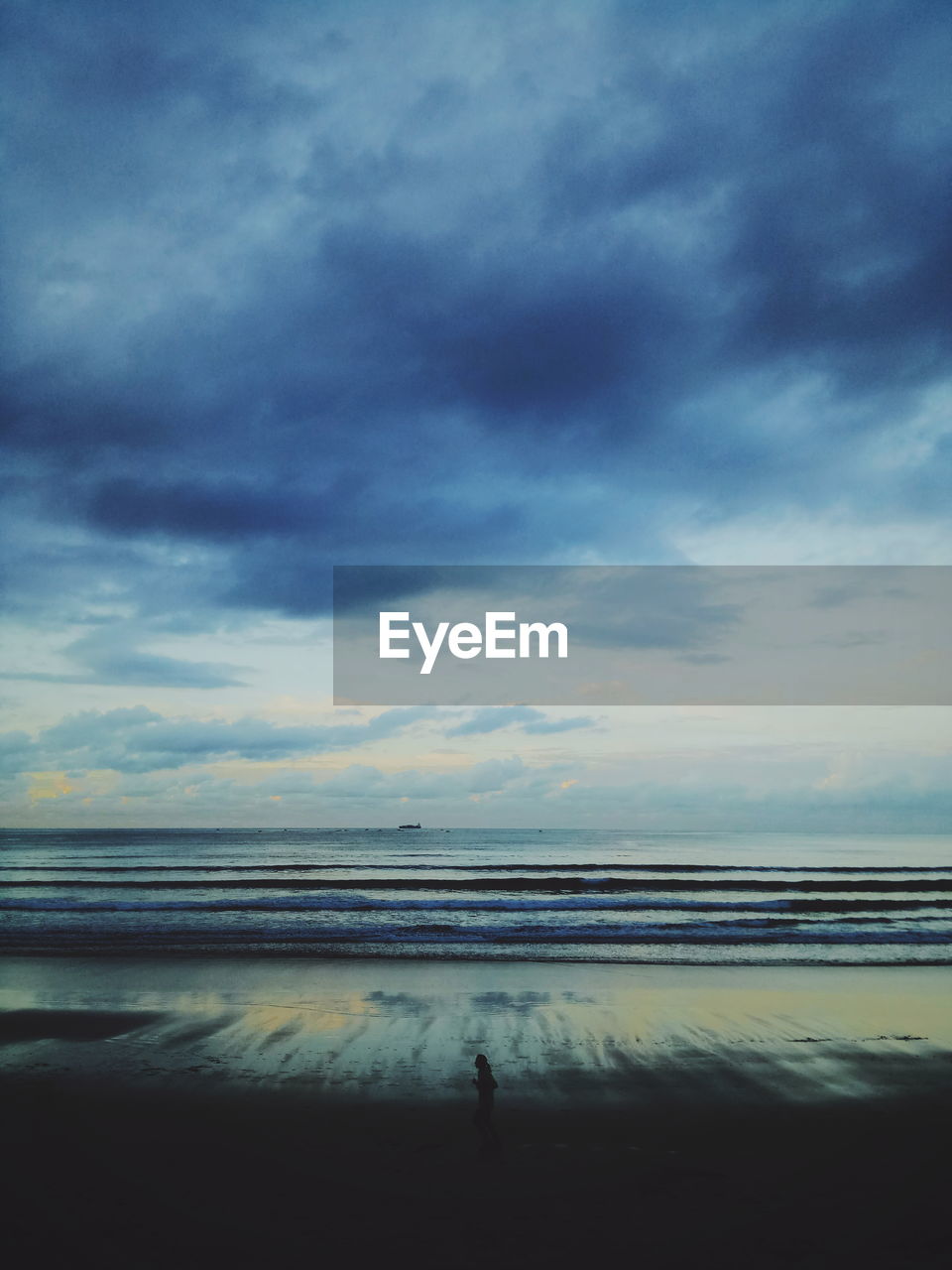 SCENIC VIEW OF BEACH AGAINST SKY DURING SUNSET