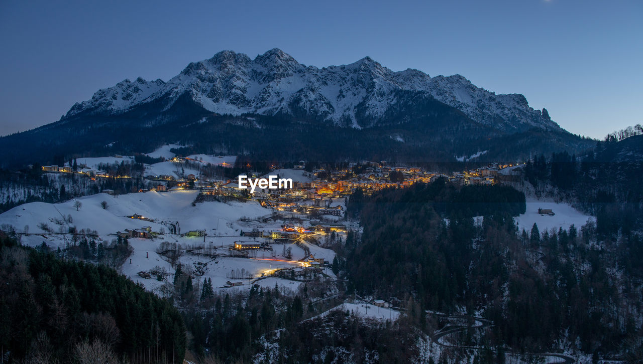 Scenic view of snow covered mountains against sky