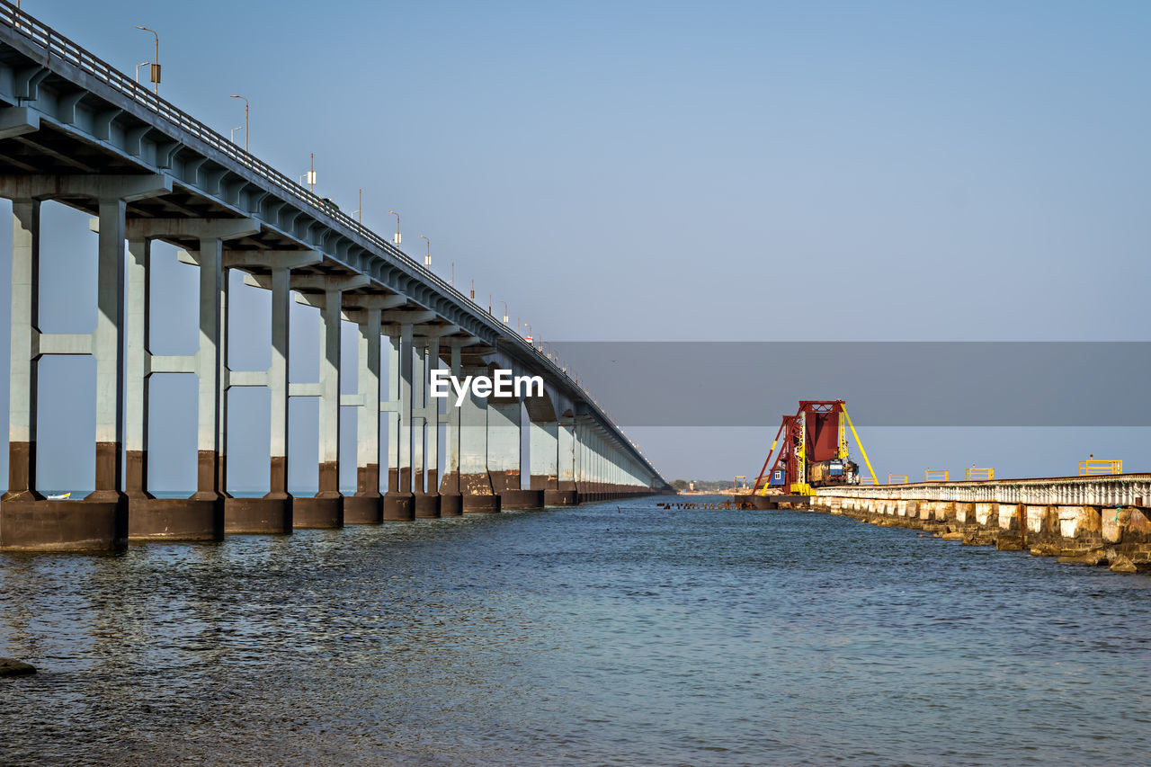  100 years old india's first sea bridge for railway , tall road bridge connecting mainland india. 