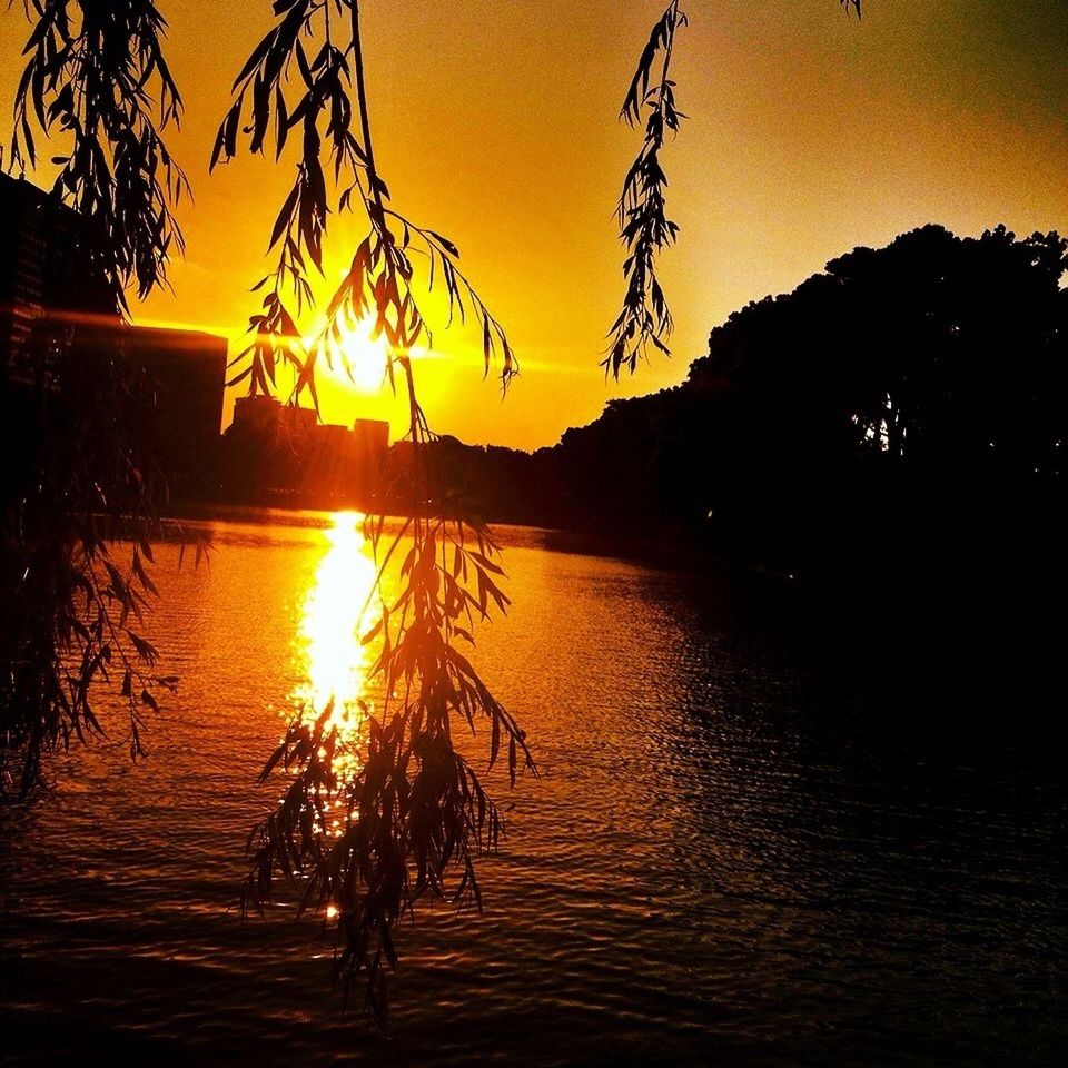 Scenic view of sunset over lake