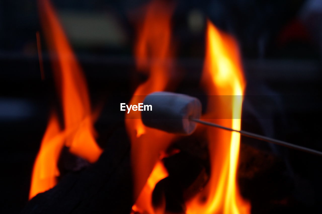 CLOSE-UP OF BURNING FIRE