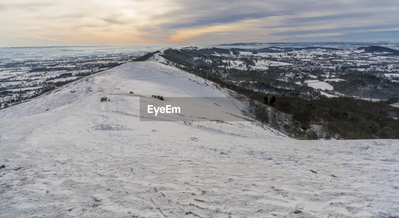 Scenic view of sea against sky during winter