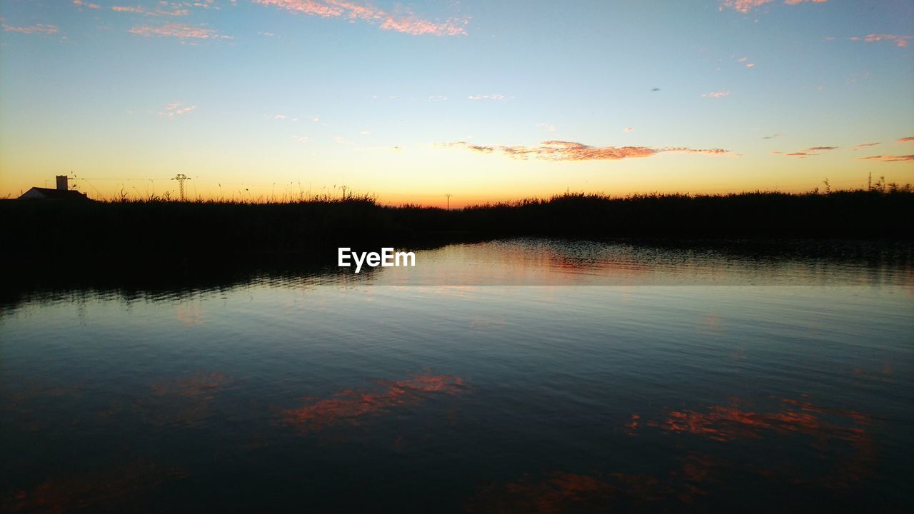 SUNSET OVER LAKE