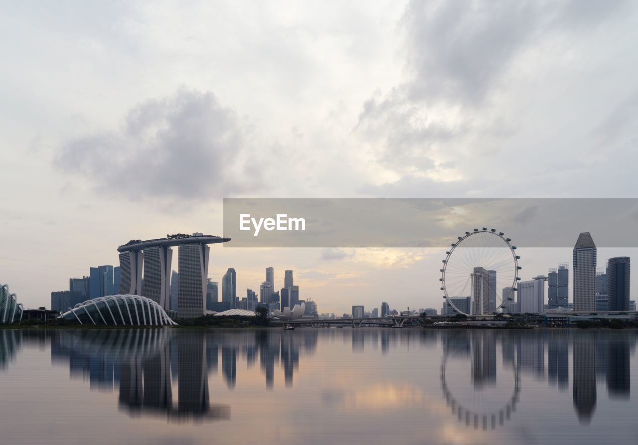 Marina bay sands at waterfront during sunset