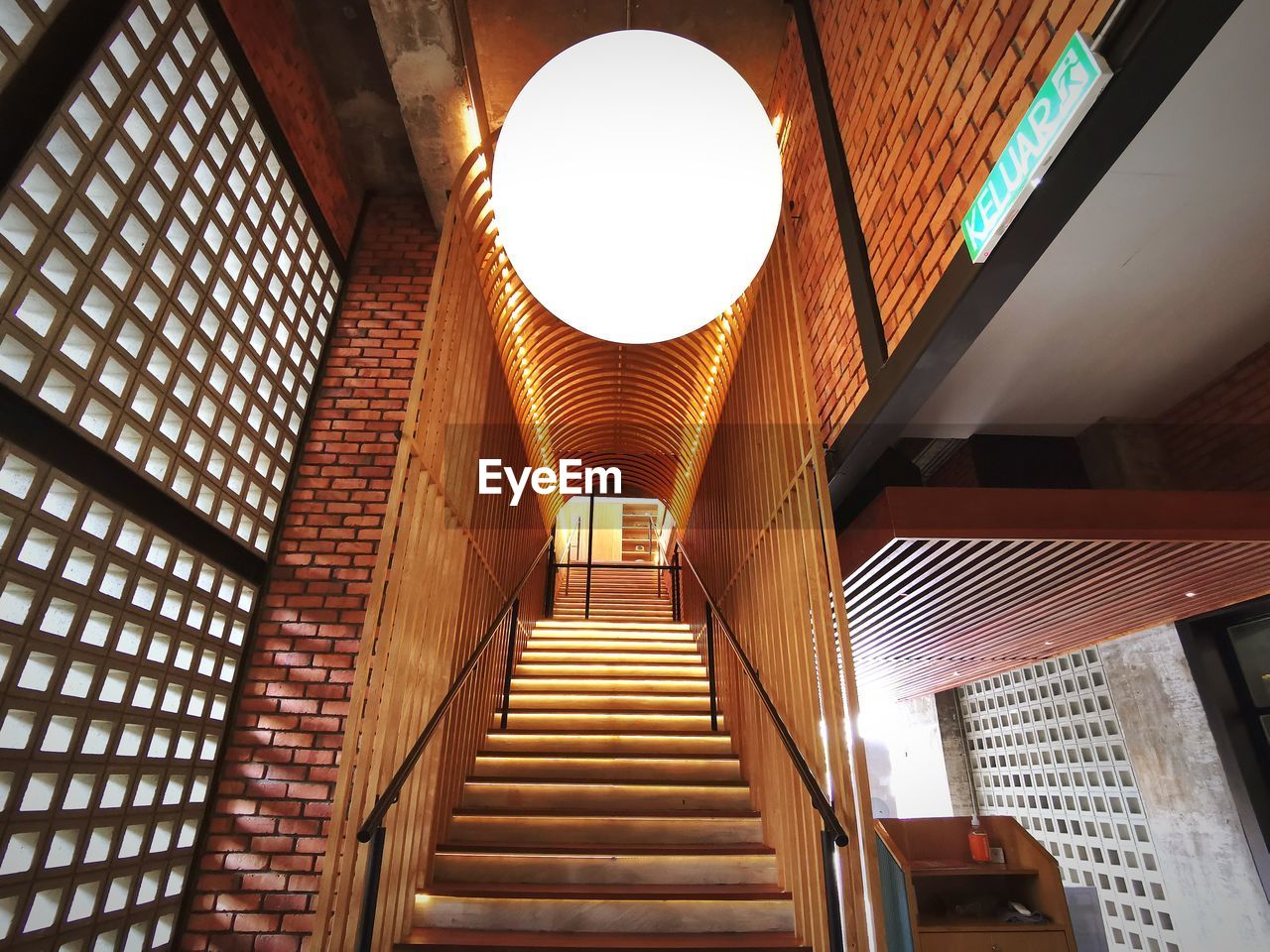 Low angle view of illuminated staircase in building