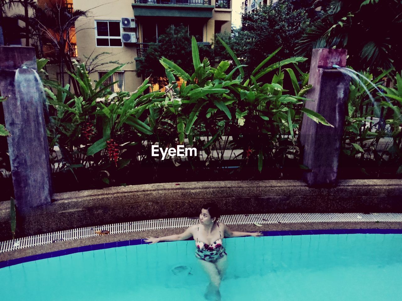 SWIMMING POOL IN BACKYARD