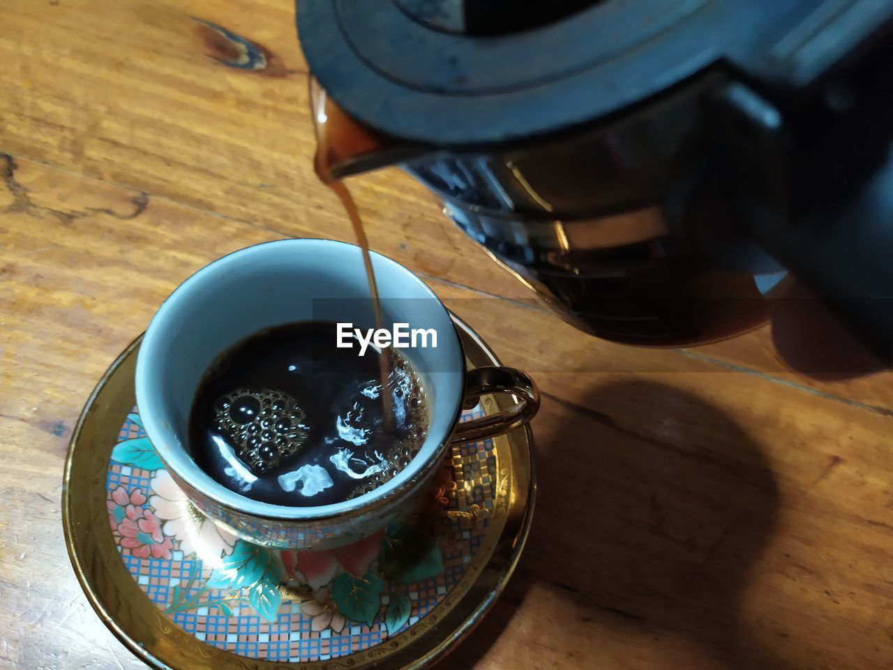 High angle view of coffee on table