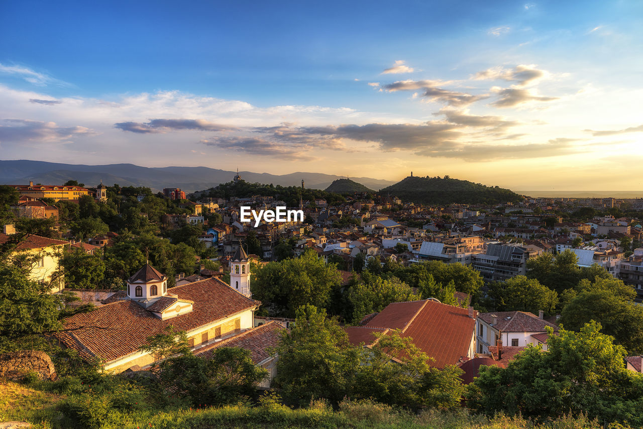 High angle view of townscape against sky at sunset