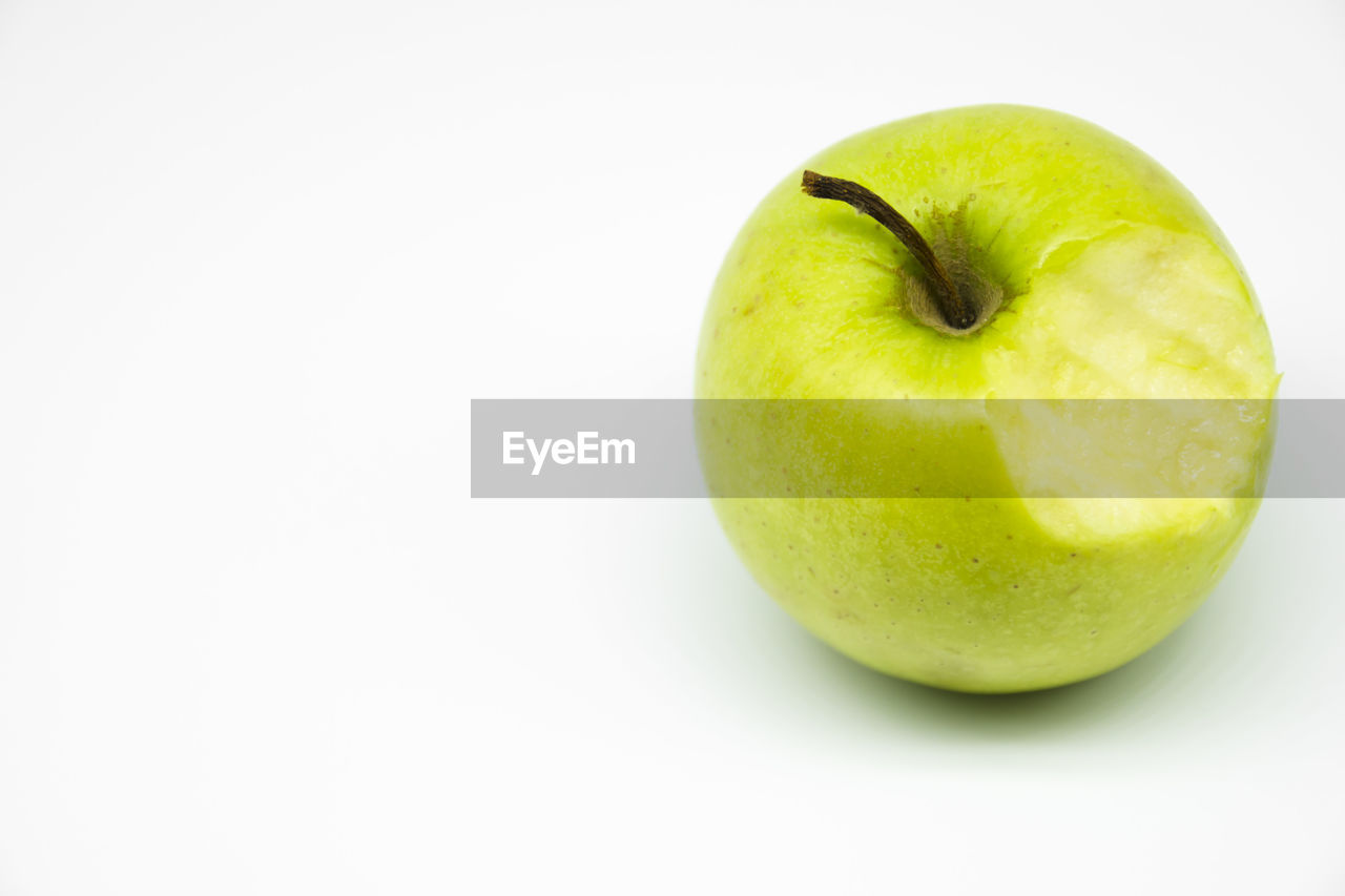 Close-up of apple against white background