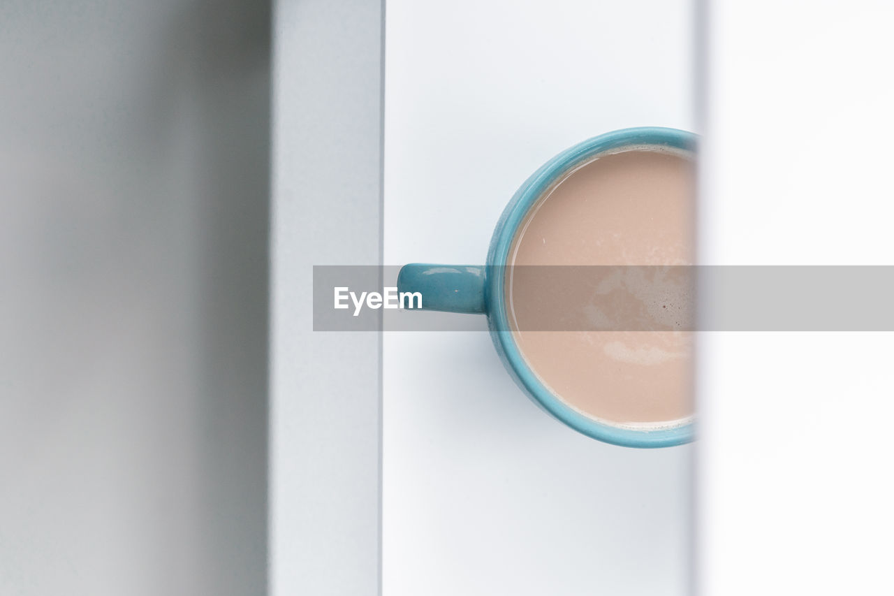 Close-up of coffee cup on table