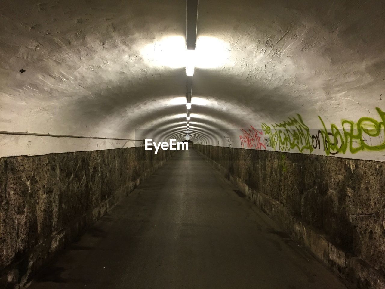 UNDERGROUND WALKWAY IN TUNNEL