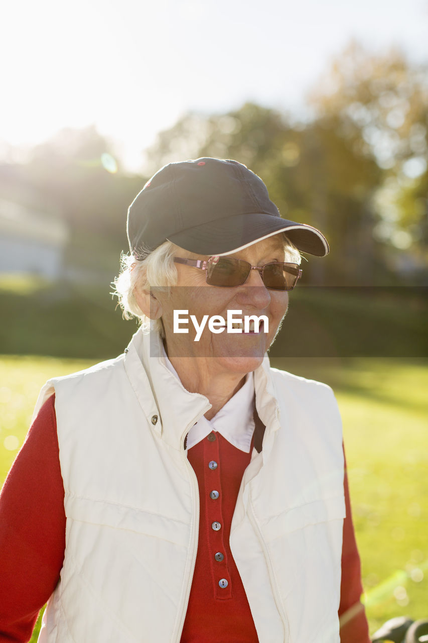 Senior woman smiling outdoors