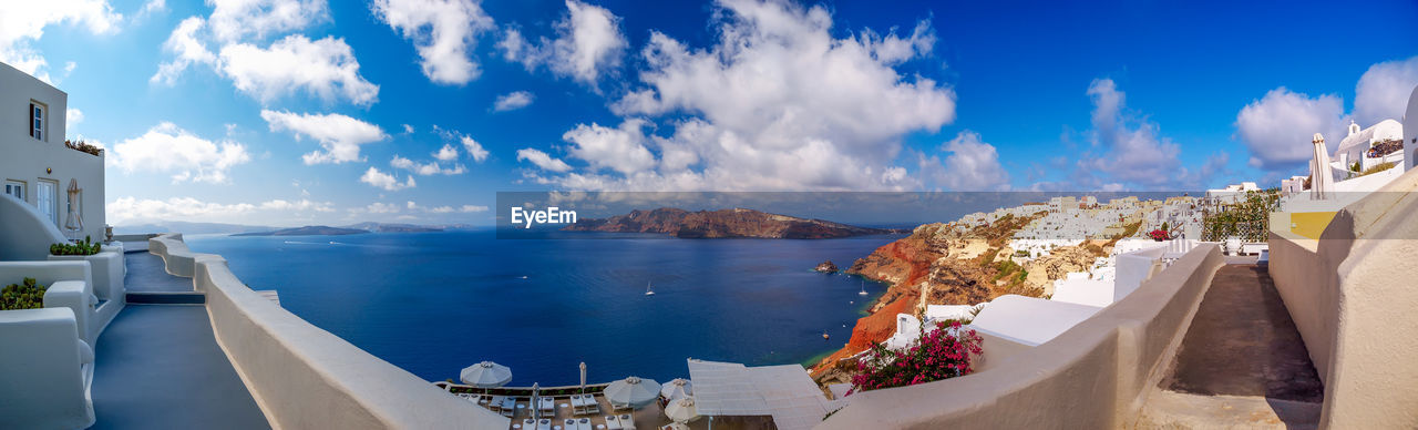 Amazing panorama santorini island view. beautiful white cave houses. santorini, cyclades, greece