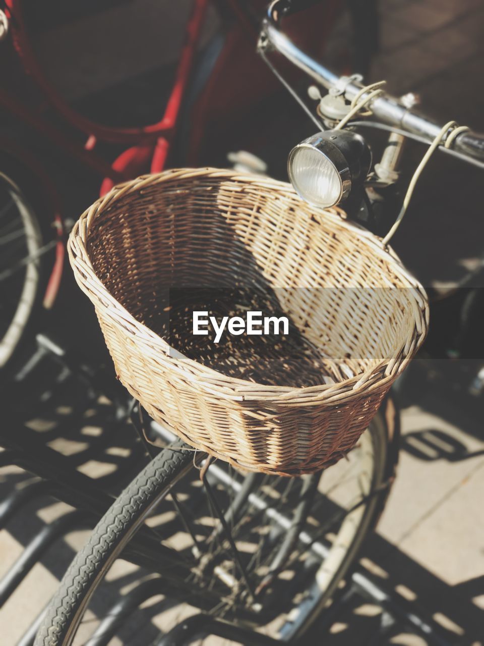 High angle view of wicker basket on bicycle