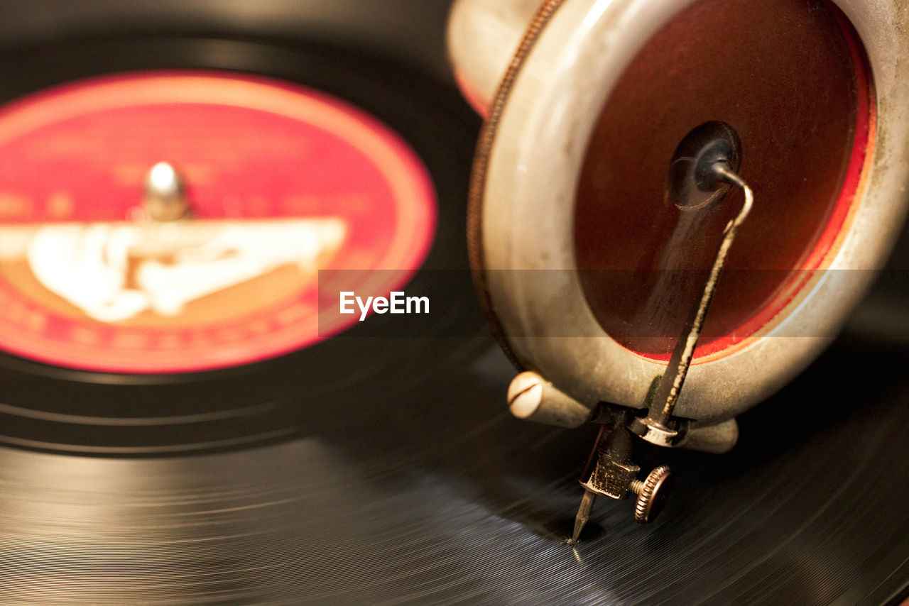 vinyl record, record, turntable, music, arts culture and entertainment, retro styled, gramophone, technology, wheel, spinning, close-up, red, audio equipment, indoors, circle, no people, motion, equipment, noise, record player needle, musical instrument