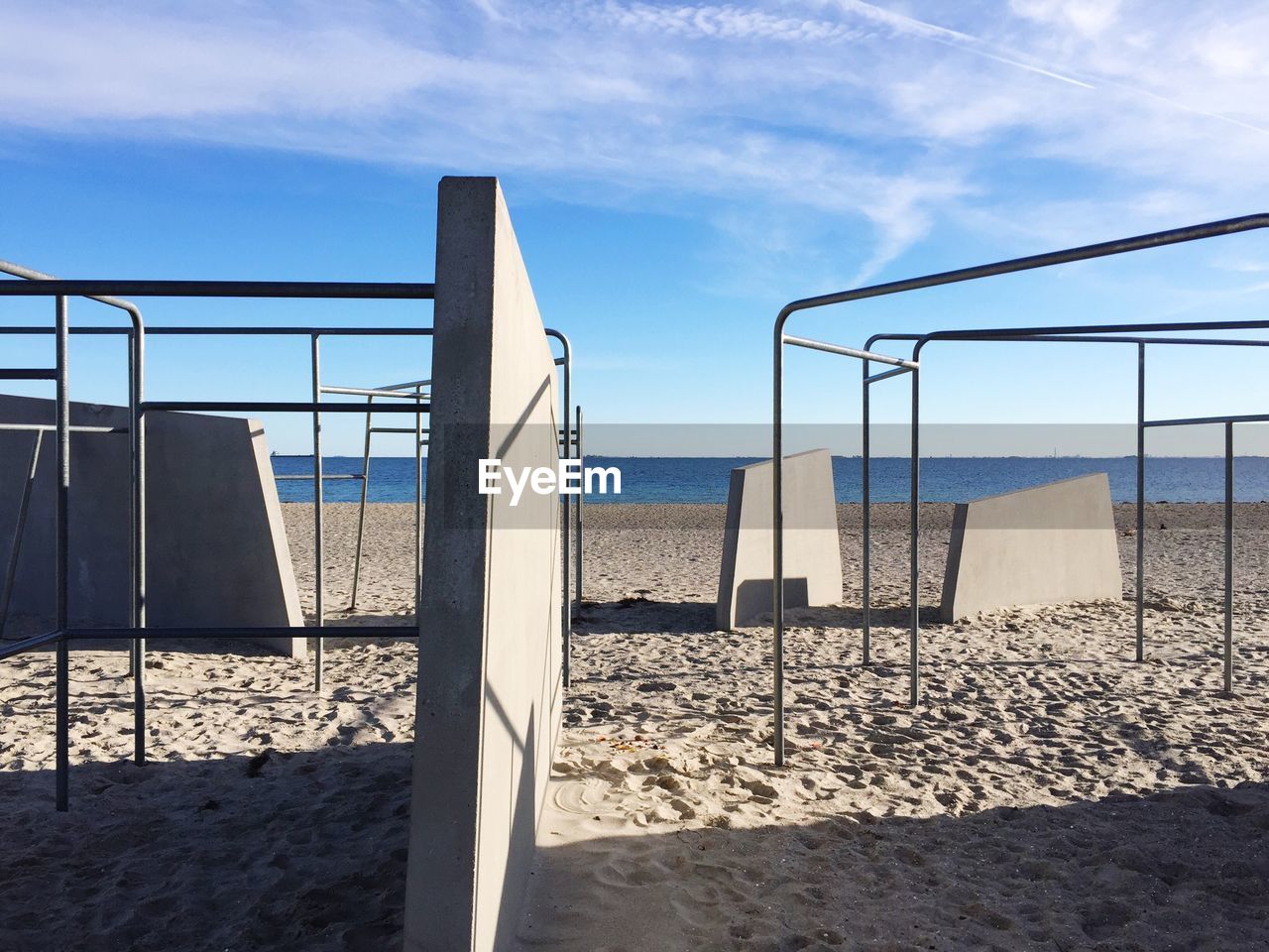 Built structure on beach against sky