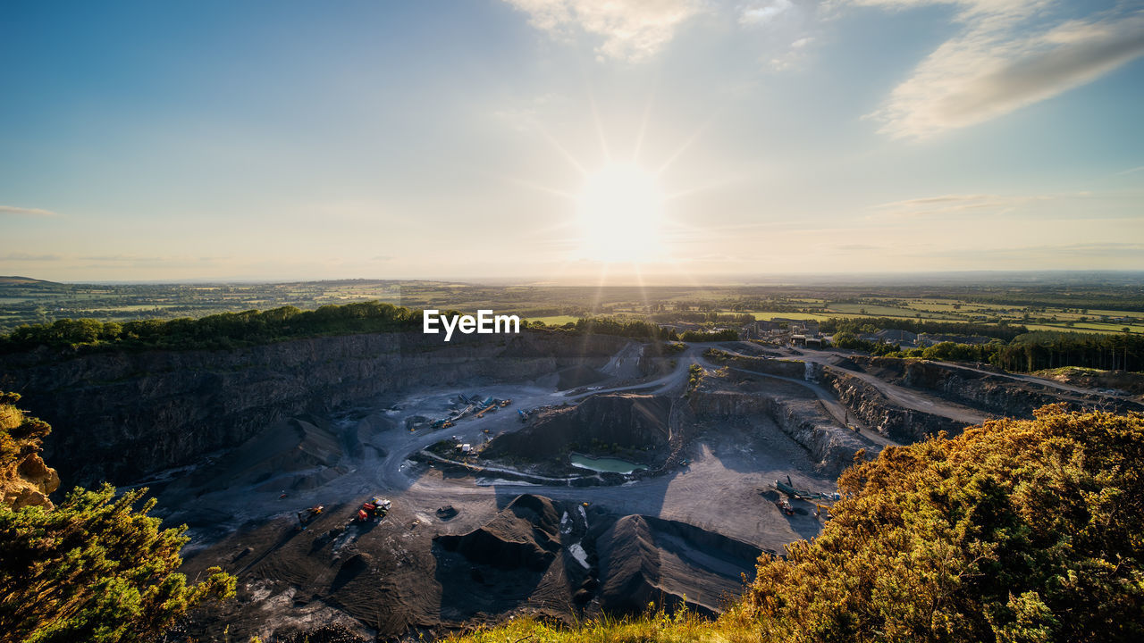 Panoramic view on allen quarry with heavy machinery in operation, ireland