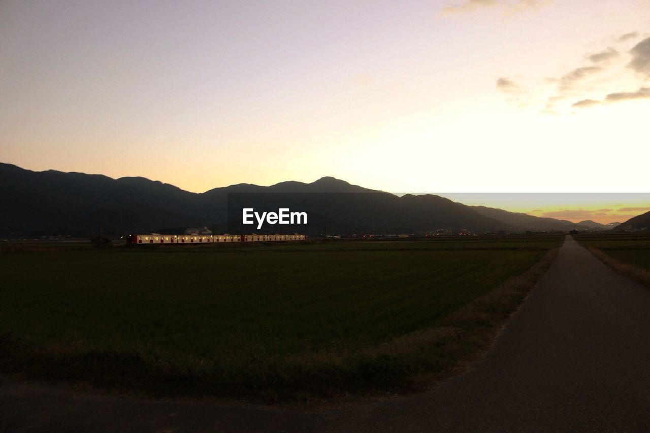 Scenic view of mountains against sky during sunset