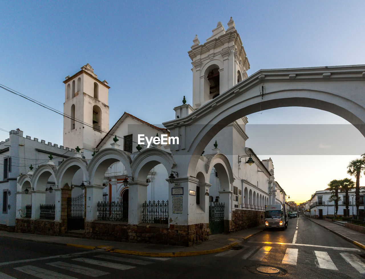 Church against sky in city