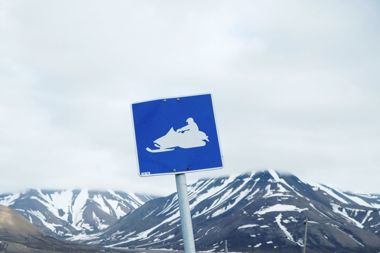 CLOSE-UP OF ROAD SIGN