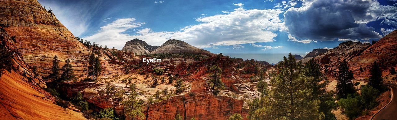 PANORAMIC VIEW OF MOUNTAINS AGAINST SKY