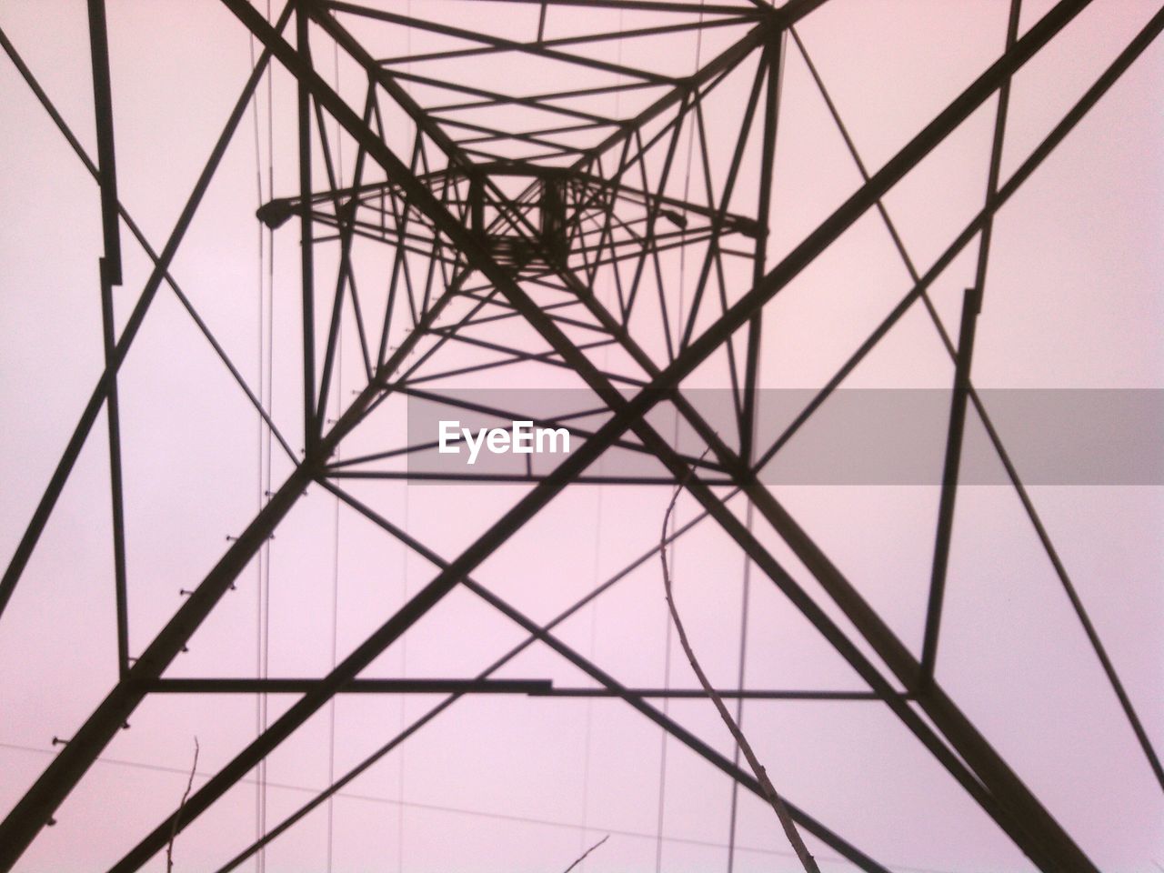 LOW ANGLE VIEW OF ELECTRICITY PYLON