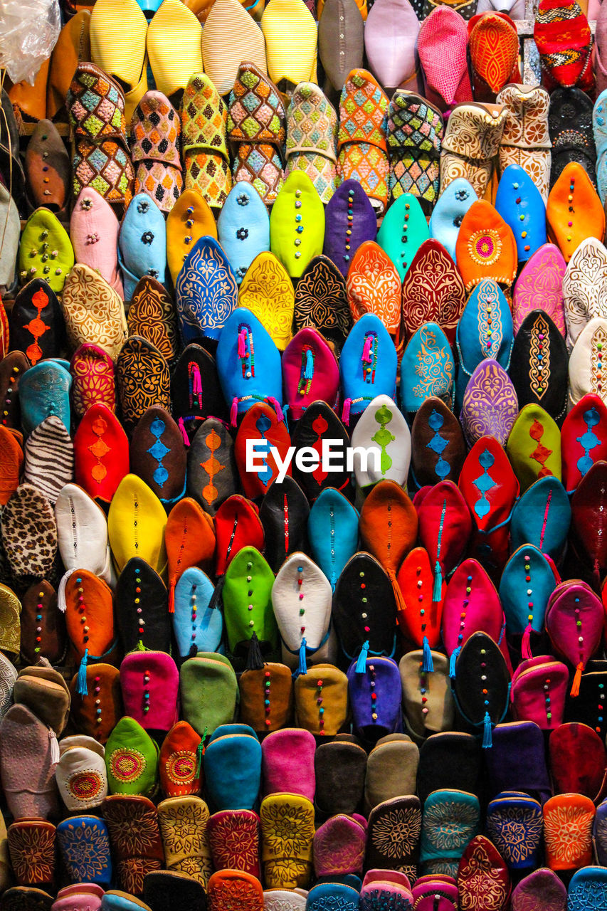 Full frame shot of multi colored shoes for sale in market