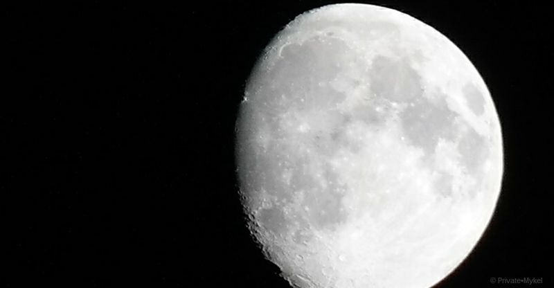 LOW ANGLE VIEW OF MOON IN SKY