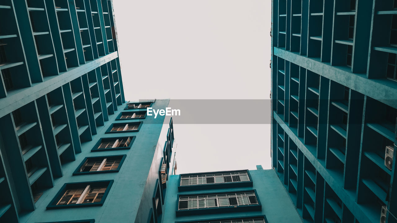 Low angle view of modern building against clear sky