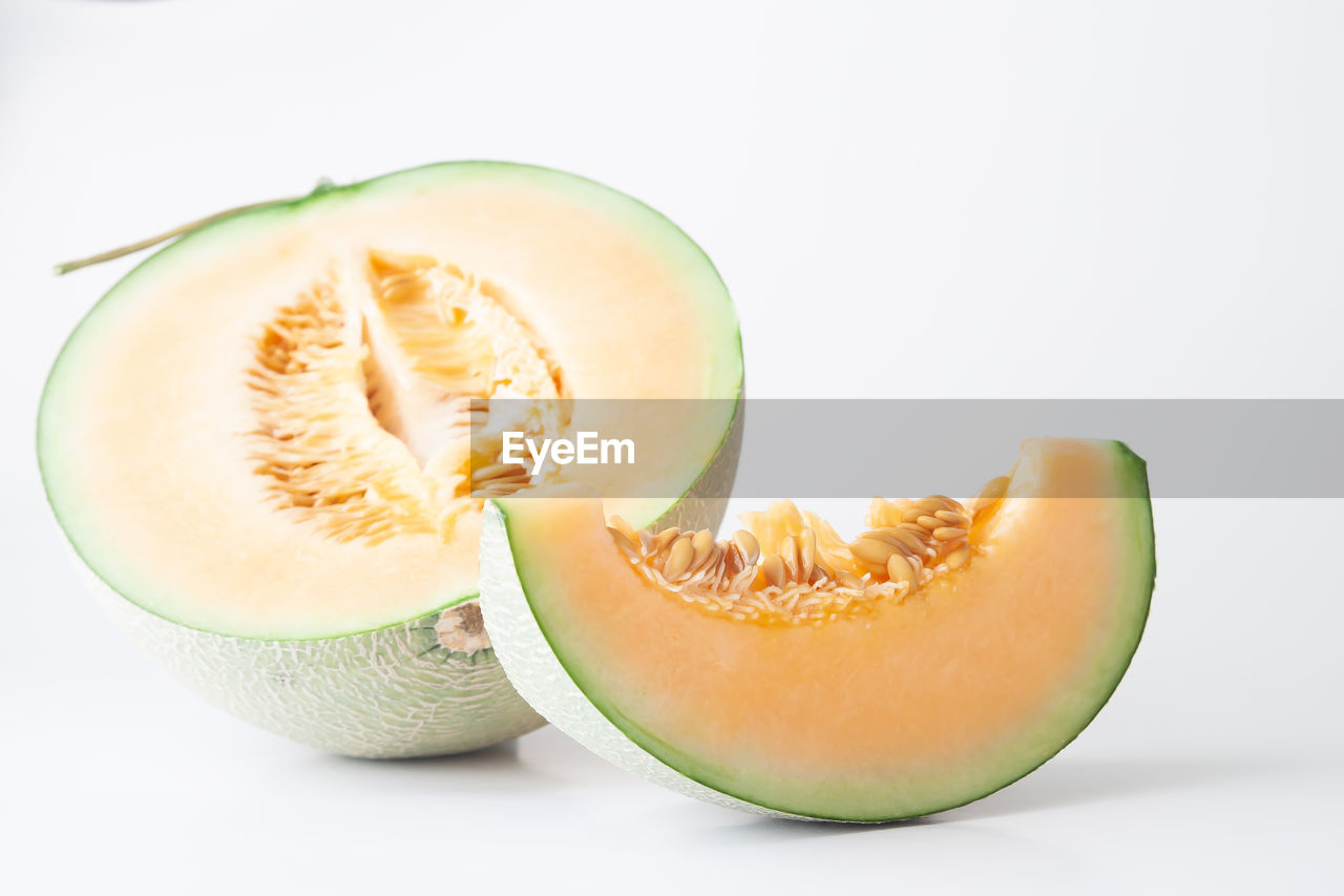 Close-up of cantaloupe against white background