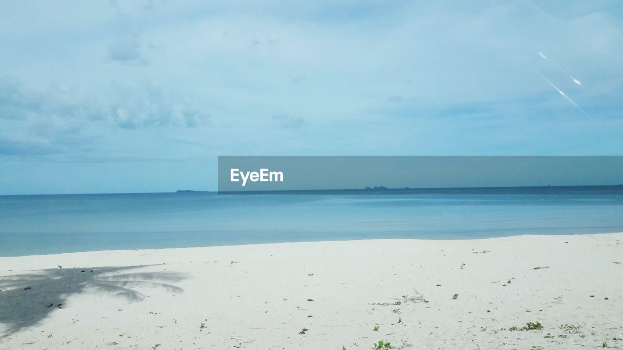 VIEW OF BEACH AGAINST SKY