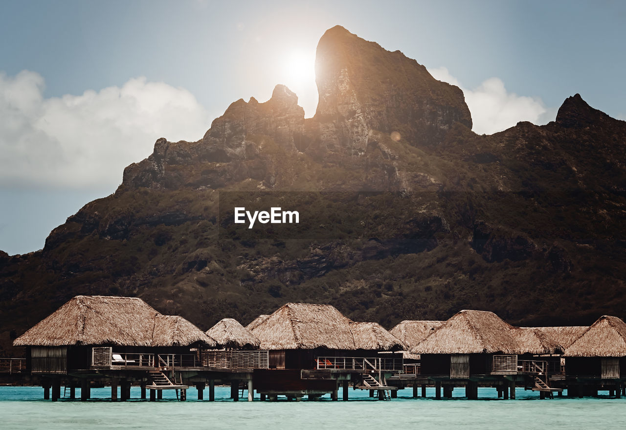 Huts in bora bora with mountain view