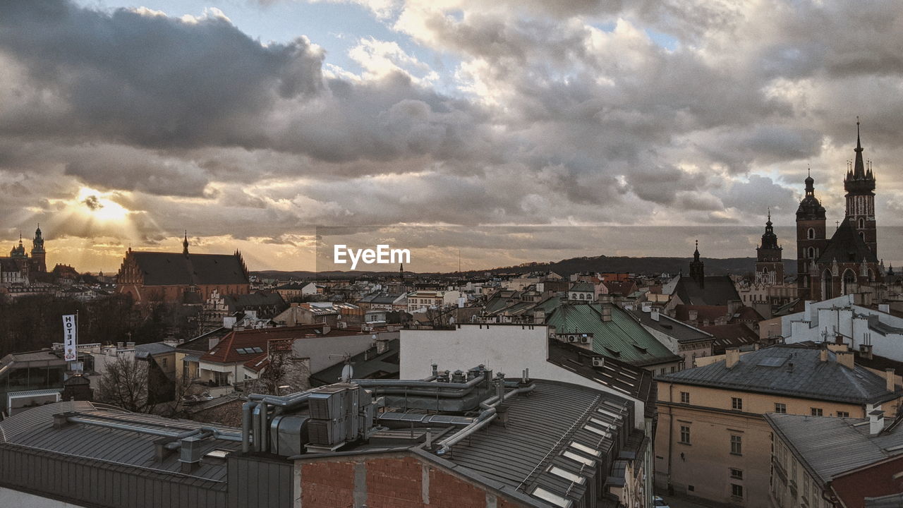 High angle view of buildings in city against sky