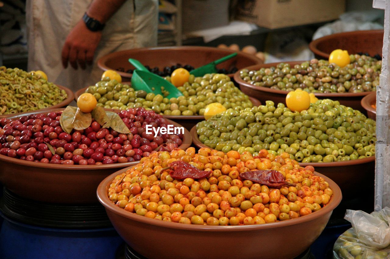 Close-up of various olives for sale in market