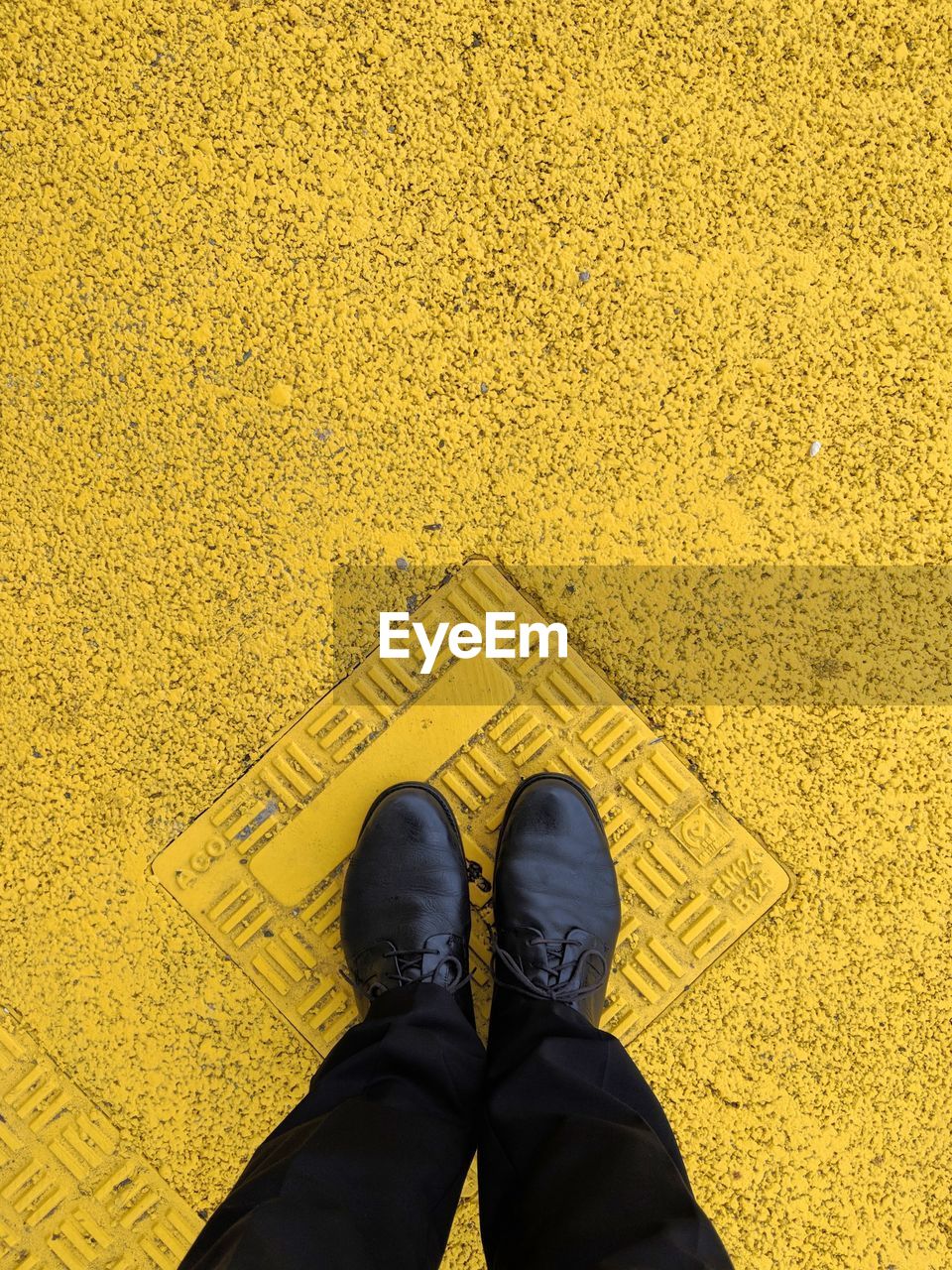 yellow, shoe, low section, human leg, one person, personal perspective, standing, high angle view, lifestyles, men, human limb, limb, directly above, human foot, day, outdoors, leisure activity, adult