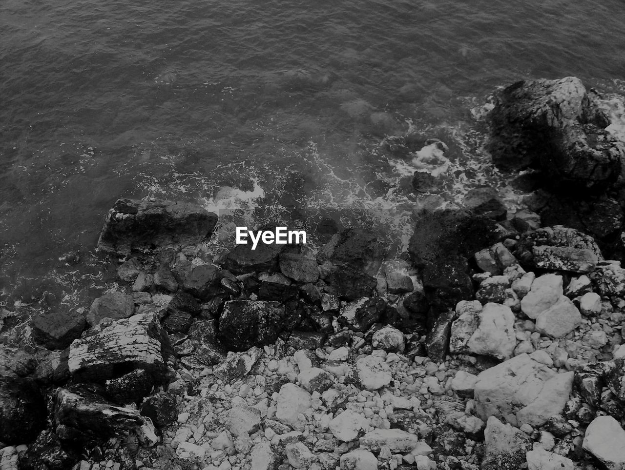 VIEW OF ROCKS AT SEA