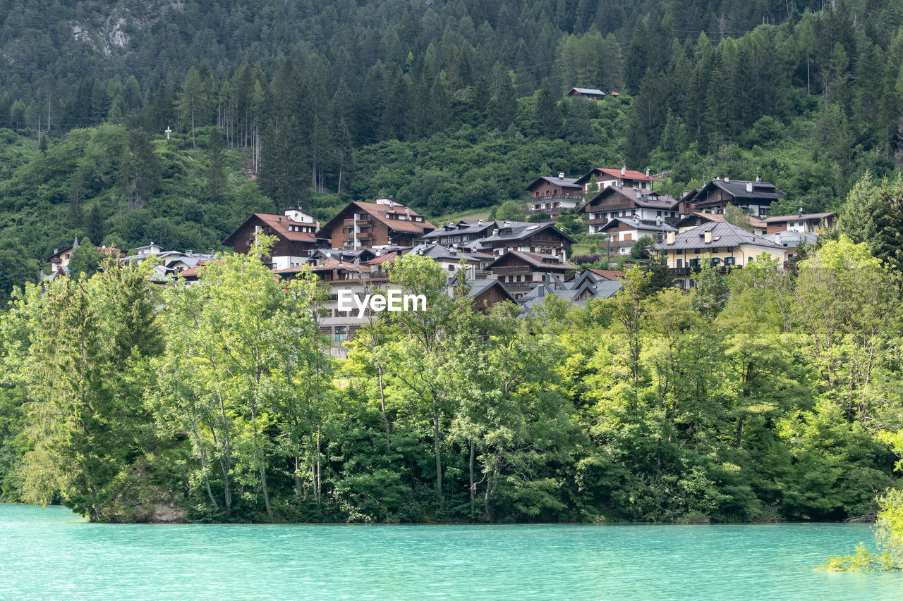 The view of lake auronzo and tre cime lavaredo and the surrounding lake town. dolomites, italy