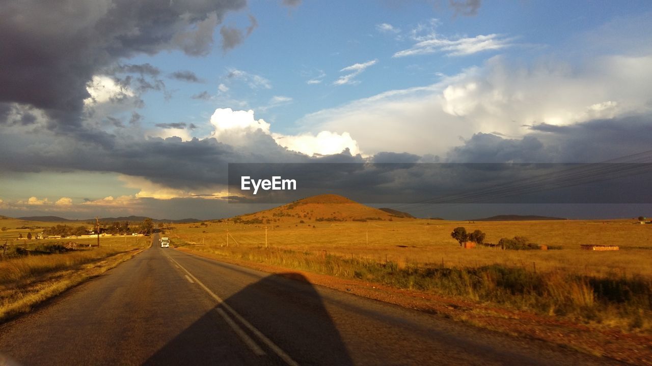 ROAD PASSING THROUGH LANDSCAPE