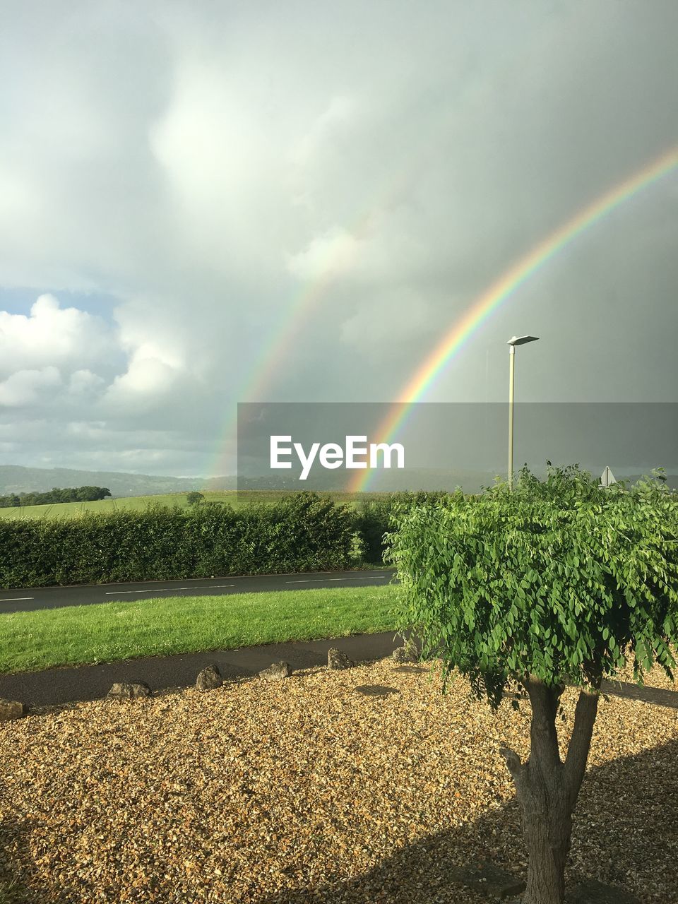 SCENIC VIEW OF RAINBOW AGAINST SKY