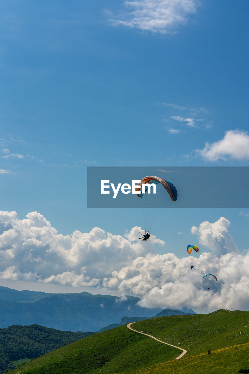 Paragliding from monte baldo over lake garda in italy.