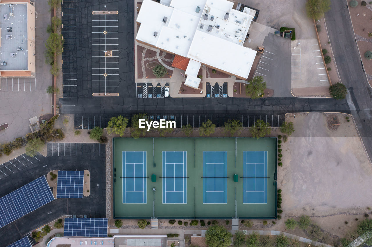 Aerial view of tennis courts straight down drone shot.