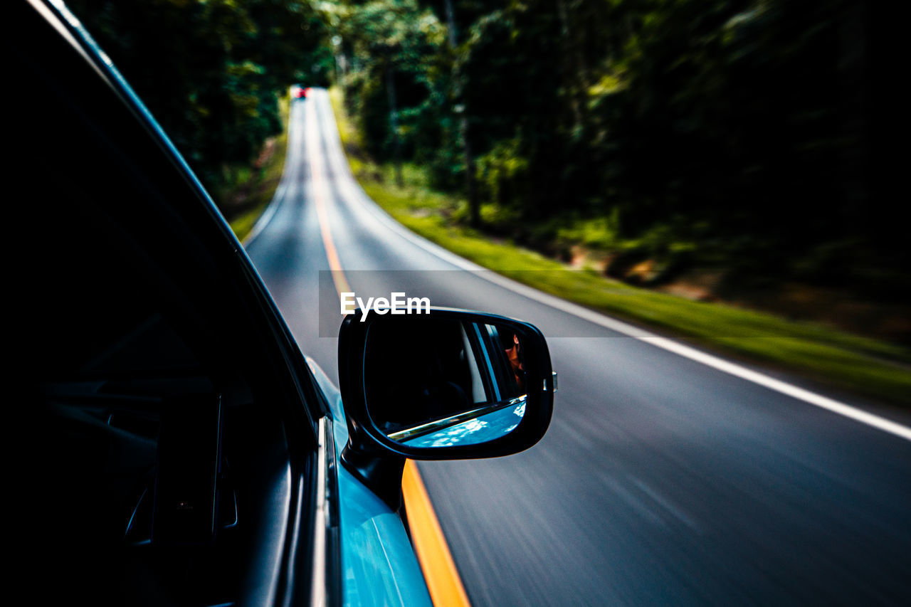 View of highway seen through car